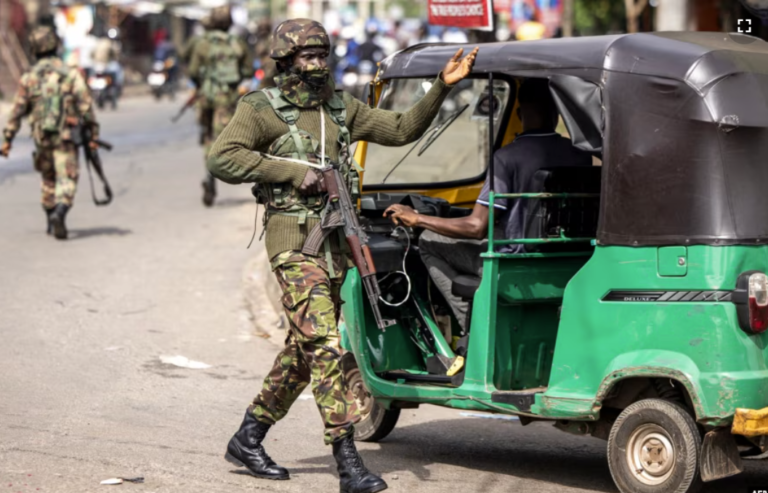 FILE A soldier of the Sierra Leone Armed Forces directs traffic