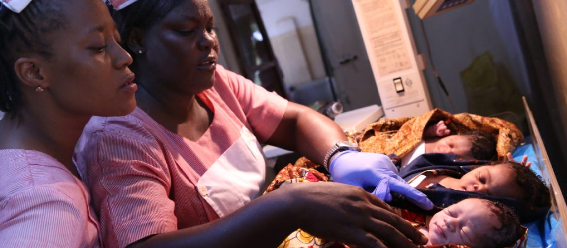 Fatmata Bamorie Turay (far left) and Elizabeth Tumoe, registered nurses look after newborns at the Princess Christian Maternity Hospital, in Freetown Sierra Leone on June 18, 2015. Photo © Dominic Chavez/World Bank
